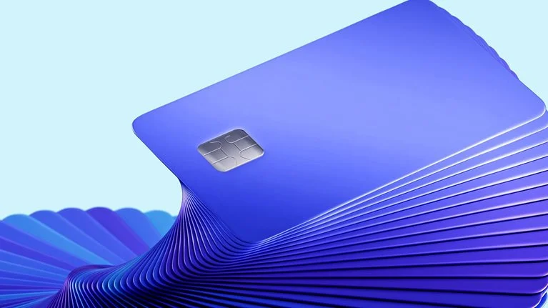 An abstract image of a stack of 3D credit cards swirling up in a repeating twisting pattern.