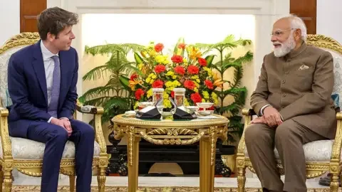Anadolu via Getty Images Indian Prime Minister Narendra Modi meets with Sam Altman, CEO of Open AI in New Delhi, India on 20 February, 2026, after India hosted the AI Impact Summit. 